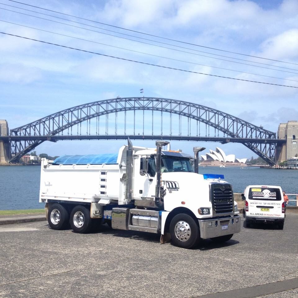 K & J tipper in front of the Sydney Harbour Bridge